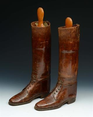 Lot 147 - A PAIR OF FIRST WORLD WAR OFFICERS TAN LEATHER FIELD BOOTS with wooden trees