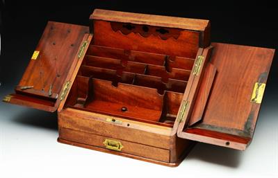 Lot 157 - A VICTORIAN MAHOGANY CORRESPONDENCE CABINET with fitted interior and folding doors