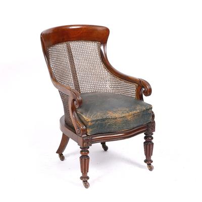 Lot 171 - A GEORGE IV MAHOGANY BERGERE LIBRARY CHAIR with cane back