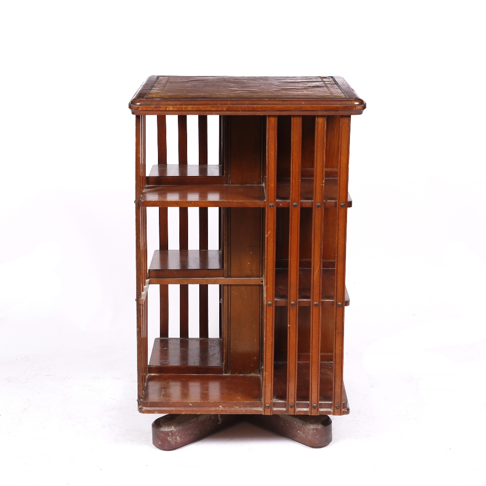 Lot 178 - A MAHOGANY SQUARE REVOLVING BOOKCASE with cupboard