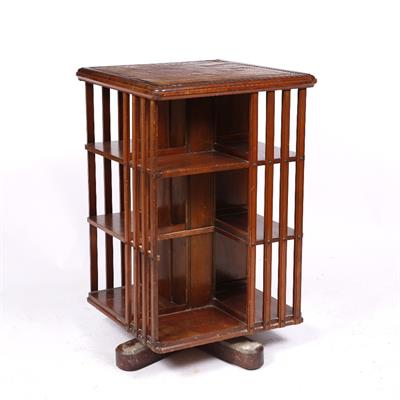 Lot 178 - A MAHOGANY SQUARE REVOLVING BOOKCASE with cupboard