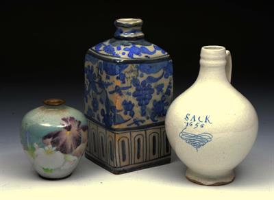 Lot 217 - A CONTINENTAL FAIENCE SQUARE BOTTLE with insect and foliate decoration