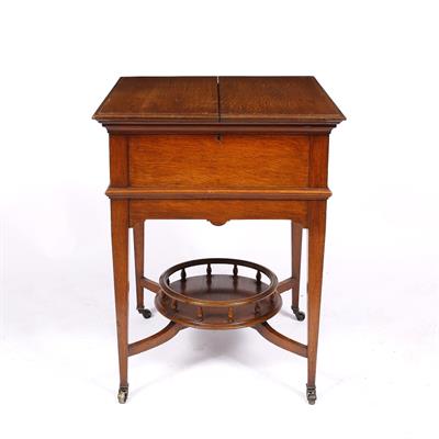 Lot 222 - A MAPLE & CO LIMITED SQUARE OAK COCKTAIL CABINET