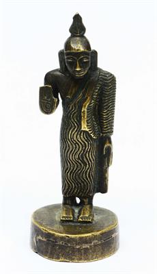 Lot 234 - A SHRI LANKAN METAL FIGURE of a standing Buddha with outstretched palm