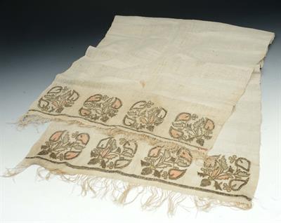 Lot 242 - A 19TH CENTURY TURKISH TOWEL  with floral motifs embroidered in silk and metal threads