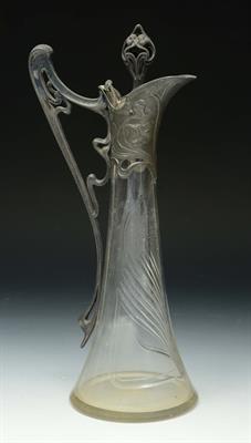 Lot 279 - AN ART NOUVEAU GLASS CLARET JUG