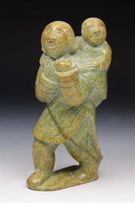 Lot 280 - AN INUIT SOAPSTONE CARVING of a man