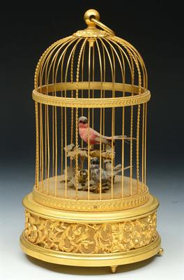 Lot 290 - A SWISS GILT METAL MUSICAL SINGING BIRD AUTOMATON