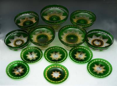 Lot 302 - A BOHEMIAN GREEN OVERLAID CUT GLASS DESSERT SERVICE