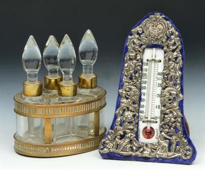 Lot 360 - A FRENCH GILT METAL OVAL SCENT BOTTLE STAND