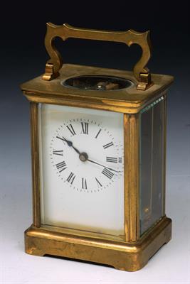 Lot 378 - A FRENCH BRASS CASED CARRIAGE TIMEPIECE with enamel dial and Roman numerals