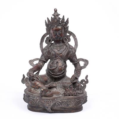 Lot 398 - AN ANTIQUE SINO TIBETAN BRONZE SEATED BHUDDA with traces of gilded ornament on a lotus leaf base