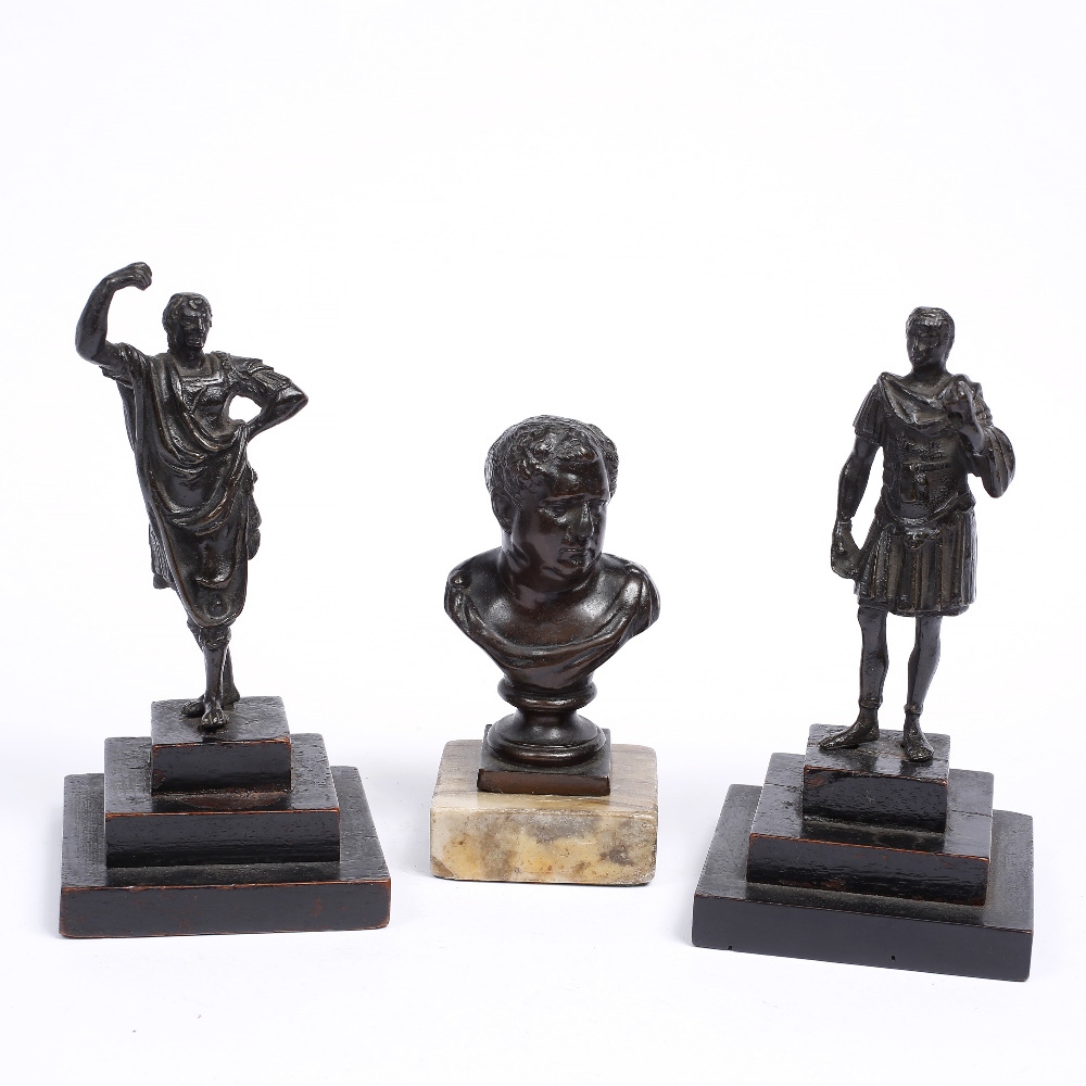 Lot 403 - A PAIR OF ANTIQUE GRAND TOUR FIGURES of Roman nobleman on wooden stepped plinths