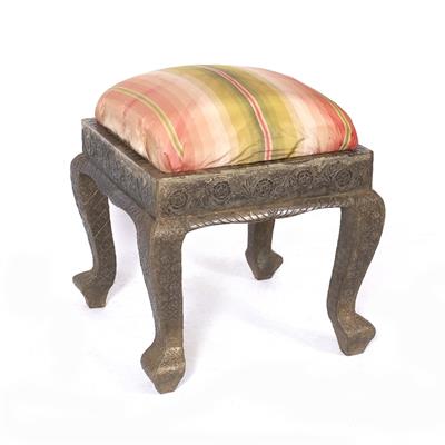 Lot 426 - AN INDIAN METAL RECTANGULAR FOOT STOOL with embossed decoration on cabriole legs