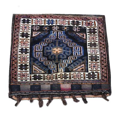 Lot 445 - A CAUCASIAN SADDLE BAG with hooked design and flat weave end