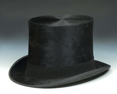 Lot 446 - A TOP HAT with retailers crest for Brown Muff & Co Ltd