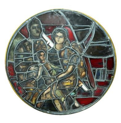 Lot 454 - A LARGE CIRCULAR MODERNIST STAINED GLASS WINDOW portraying the Holy Family