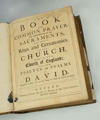 Lot 497 - THE BOOK OF COMMON PRAYER OXFORD VERSION. John Baskett (printer) 1833. Family bible with inscription