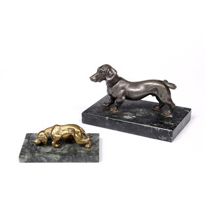 Lot 25 - A SILVERED METAL FIGURE OF A DACHSHUND