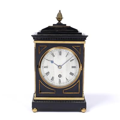 Lot 32 - A REGENCY STYLE EBONISED AND BRASS MOUNTED TIMEPIECE