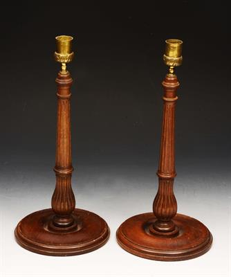 Lot 103 - A PAIR OF CHIPPENDALE STYLE MAHOGANY CANDLESTICKS