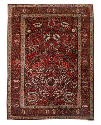 Lot 136 - AN OLD PERSIAN KIRMAN BLUE GROUND CARPET