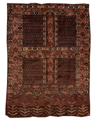 Lot 139 - A TURKOMAN HATCHLI WINE RED GROUND RUG