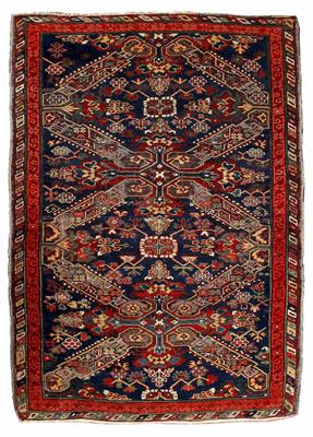 Lot 141 - AN ANTIQUE SHIRVAN BLUE GROUND RUG