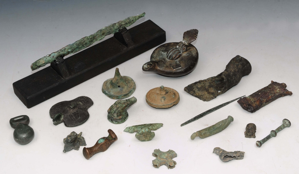 Lot 166 - A ROMAN BRONZE OIL LAMP