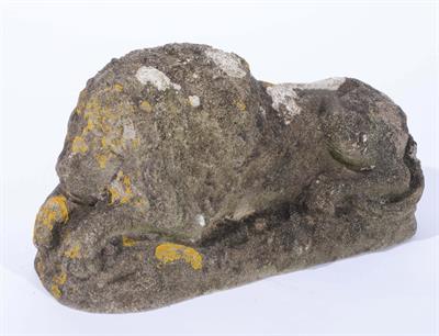 Lot 174 - A WEATHERED RECONSTITUTED STONE MODEL OF A RECLINING LION