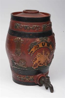 Lot 182 - A 19TH CENTURY RED GLAZED RUM BARREL