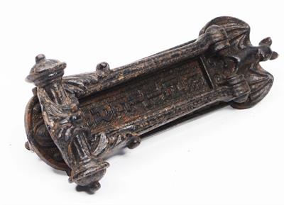 Lot 223 - A VICTORIAN CAST IRON DOOR KNOCKER / LETTER BOX