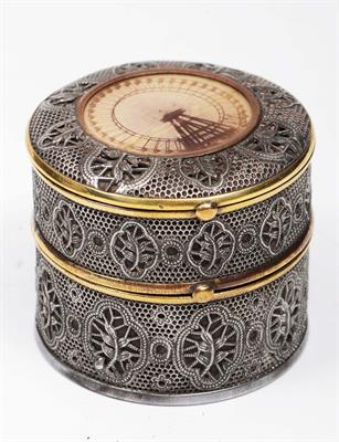 Lot 224 - A WHITE FILIGREE METAL CYLINDRICAL TWO SECTIONAL BOX