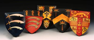 Lot 239 - A GROUP OF FIVE PAINTED ARMORIAL SHIELDS