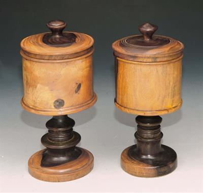 Lot 246 - A NEAR PAIR OF TREEN CUPS AND COVERS