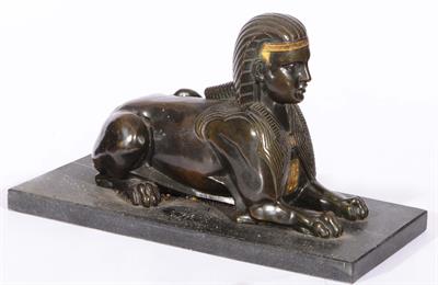 Lot 286 - AN EGYPTIAN REVIVAL BRONZE SPHINX