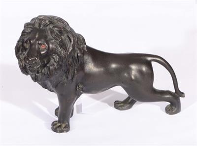 Lot 287 - AN ORIENTAL BRONZE MODEL OF A LION