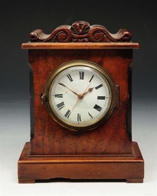 Lot 303 - A 19TH CENTURY FIGURED WALNUT MANTEL TIMEPIECE