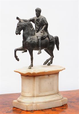 Lot 332 - AN OLD BRONZED METAL FIGURE OF A NOBLEMAN ON HORSEBACK