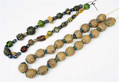 Lot 350 - A NECKLACE OF ISLAMIC GLASS BEADS