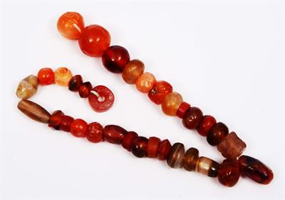 Lot 379 - A STRING OF ANCIENT INDIAN CARNELIAN BEADS