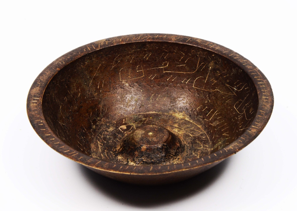 Lot 380 - A MIDDLE EASTERN ISLAMIC BRONZE DIVINATION OR 'MAGIC' BOWL