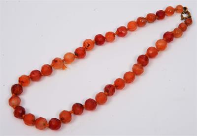 Lot 388 - A CHINESE CORNELIAN BEAD NECKLACE