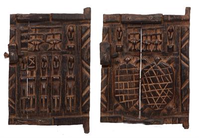 Lot 408 - TWO AFRICAN 'DOGON' WOODEN WINDOW SHUTTERS or doors with stylized figural decoration 29cm x 19cm