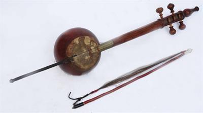 Lot 120 - AN OLD MIDDLE EASTERN SPIKE FIDDLE