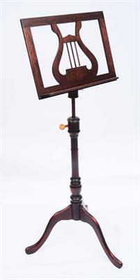 Lot 122 - A GEORGE III STYLE MAHOGANY MUSIC STAND