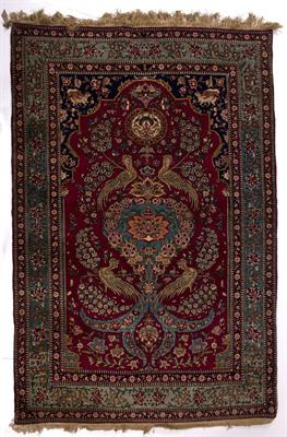 Lot 126 - A KASHAN RED GROUND RUG