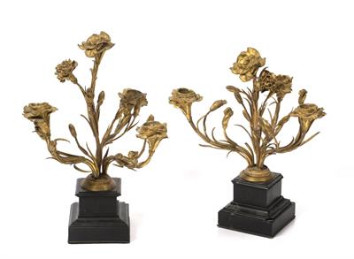 Lot 129 - A PAIR OF GILT METAL FOUR BRANCH REGENCY STYLE CANDLE HOLDERS