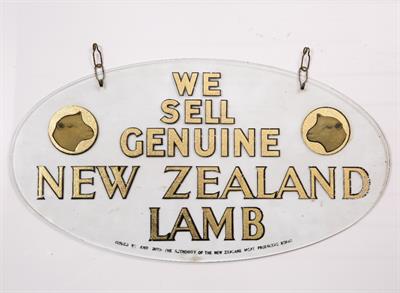 Lot 296 - AN OVAL GLASS ADVERTISING SIGN