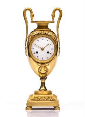 Lot 318 - A FRENCH EMPIRE ORMOLU PENDULE MANTEL CLOCK